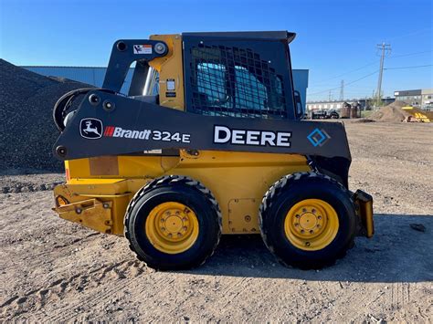 DEERE 324 Wheel Skid Steers For Sale in LONSDALE, 